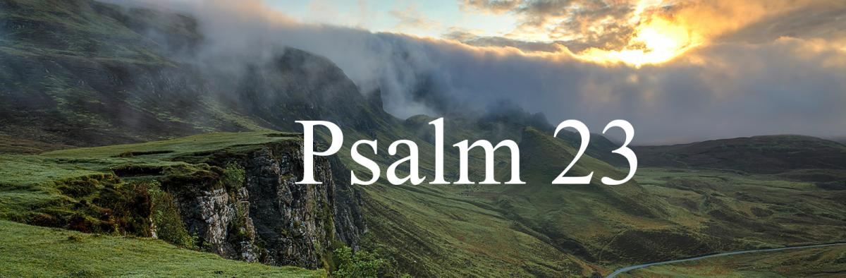 A green countryside scene with fog rising and the words Psalm 23